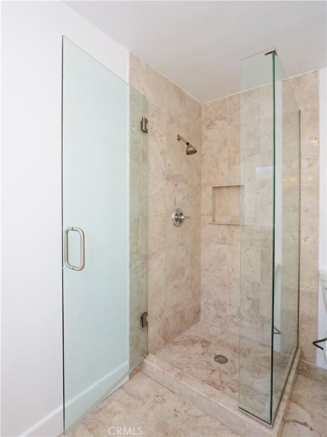 bathroom with an enclosed shower