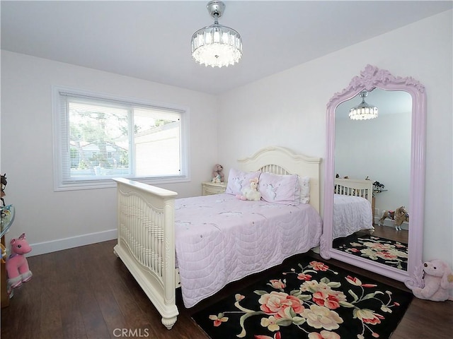 bedroom featuring dark wood-type flooring