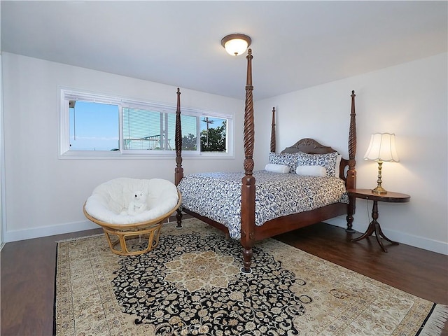 bedroom with hardwood / wood-style flooring