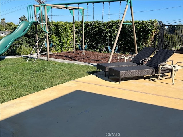 view of playground with a yard