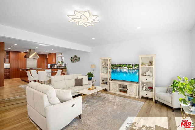 living room with light hardwood / wood-style floors