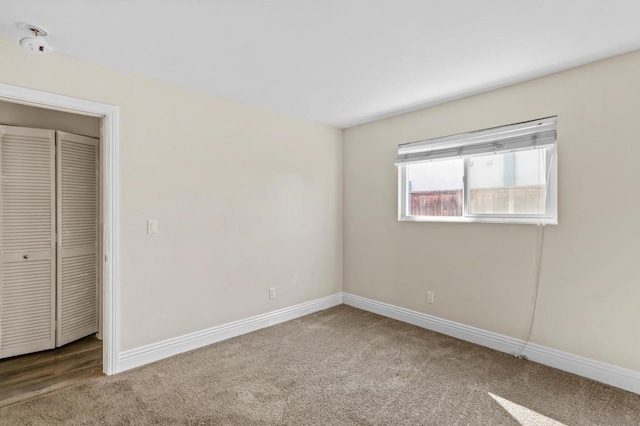 unfurnished bedroom featuring carpet