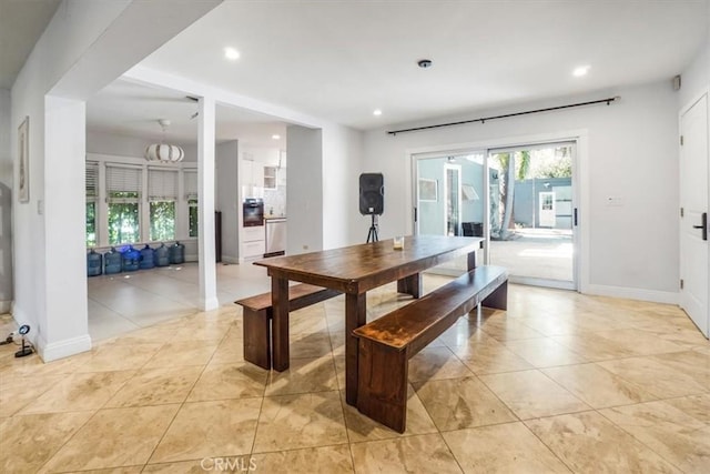 dining area featuring a healthy amount of sunlight and light tile patterned floors