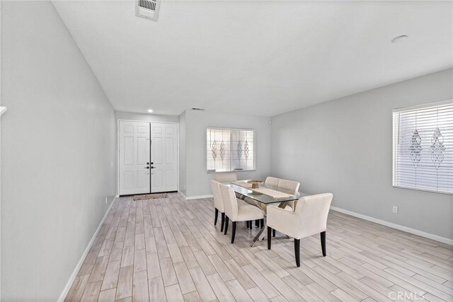 dining room featuring light hardwood / wood-style floors