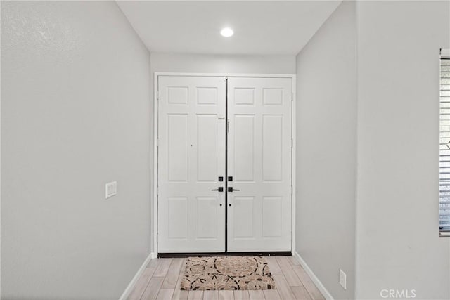 entrance foyer featuring light hardwood / wood-style floors