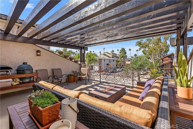 view of patio featuring an outdoor living space with a fire pit, area for grilling, and a pergola