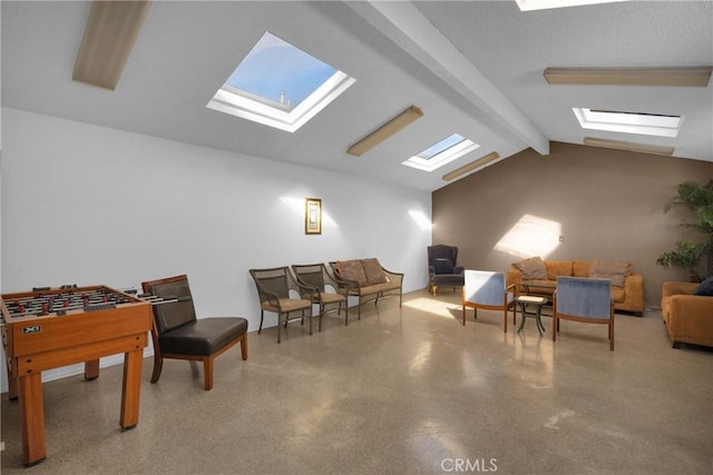 interior space featuring lofted ceiling with beams