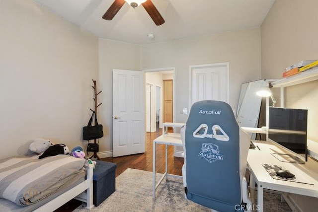 interior space featuring dark hardwood / wood-style floors and ceiling fan