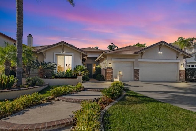 view of front of home with a garage