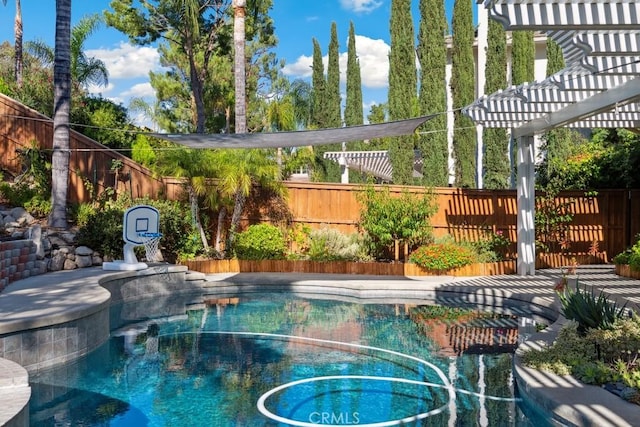 view of pool featuring a jacuzzi