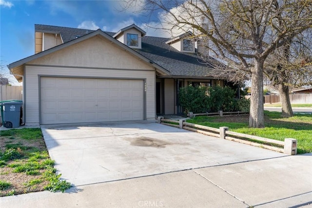 view of front facade with driveway, roof with shingles, an attached garage, fence, and a front yard