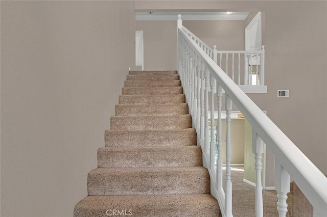 stairs with carpet and visible vents