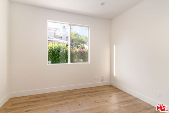 empty room featuring light hardwood / wood-style floors