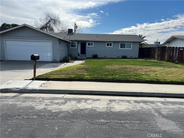 single story home with a front lawn and a garage