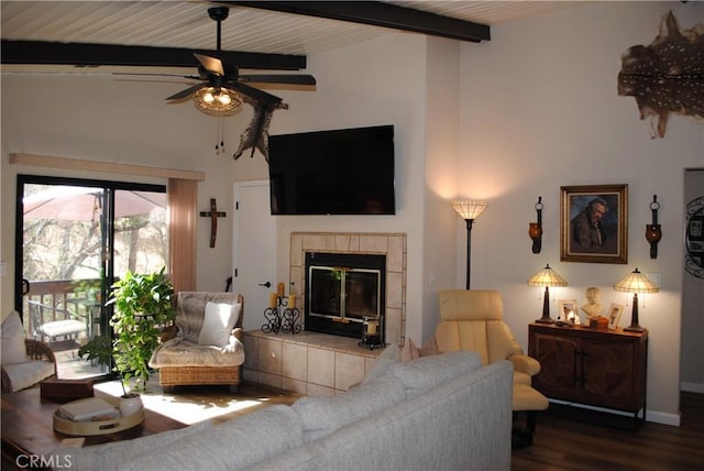 living room with a fireplace, ceiling fan, wooden ceiling, beamed ceiling, and hardwood / wood-style floors