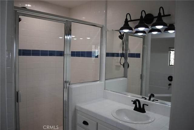 bathroom with vanity and walk in shower