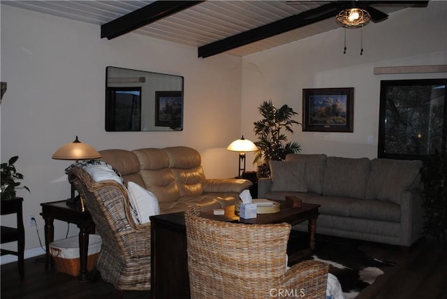 living room featuring ceiling fan, dark hardwood / wood-style flooring, and beamed ceiling