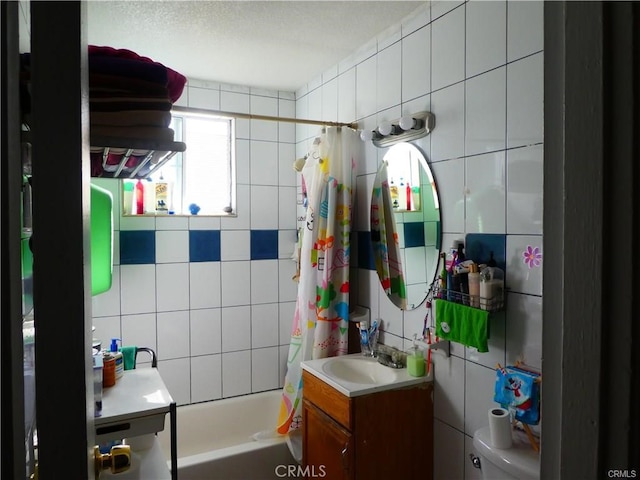 full bathroom featuring vanity, toilet, tile walls, and shower / bathtub combination with curtain