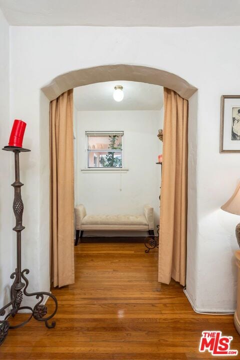 hall featuring hardwood / wood-style flooring