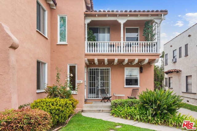 exterior space featuring a balcony