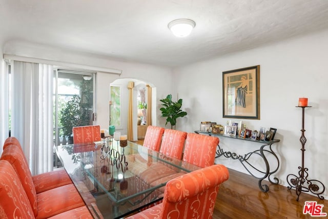 dining space featuring hardwood / wood-style floors