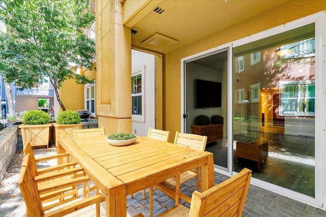 balcony with a patio area