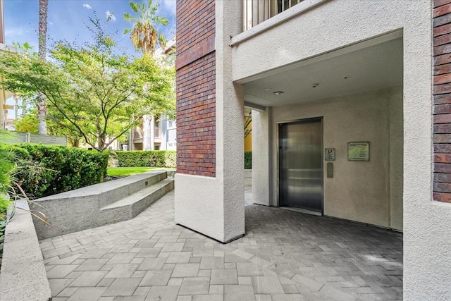 view of patio / terrace with elevator