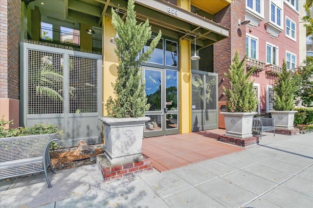 property entrance with a patio