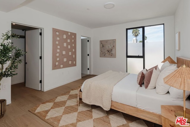 bedroom featuring light hardwood / wood-style flooring