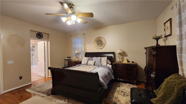 bedroom featuring hardwood / wood-style floors and ceiling fan