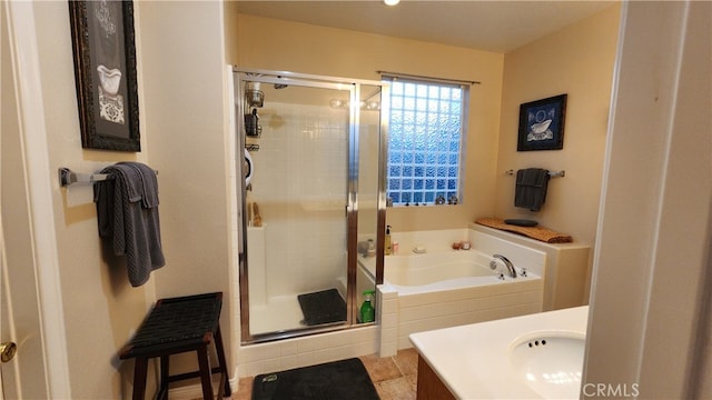 bathroom with vanity, plus walk in shower, and tile patterned flooring