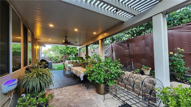 view of patio with a pergola, ceiling fan, and area for grilling