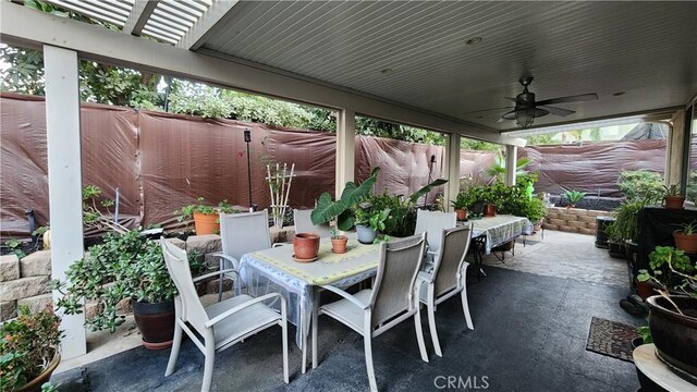 view of patio with ceiling fan