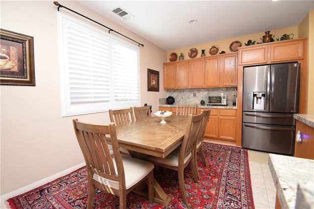 view of tiled dining room