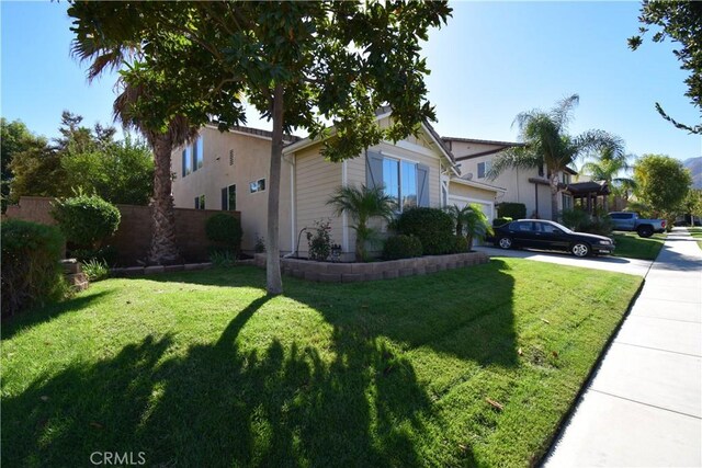 view of home's exterior with a lawn