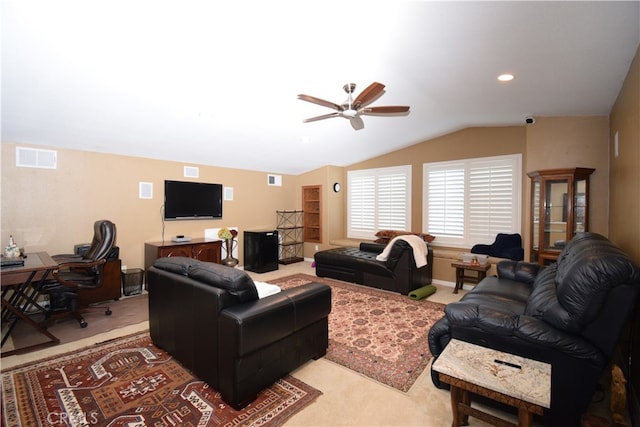 carpeted living room with vaulted ceiling and ceiling fan