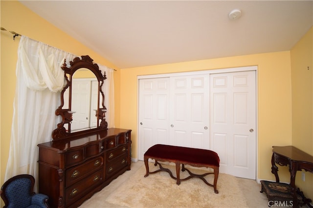 living area with light colored carpet