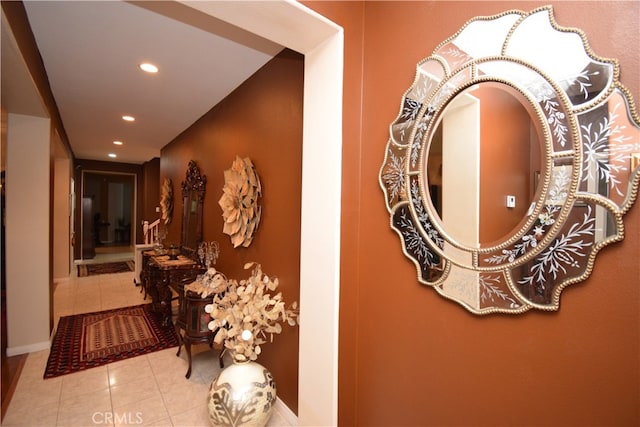 corridor with light tile patterned flooring