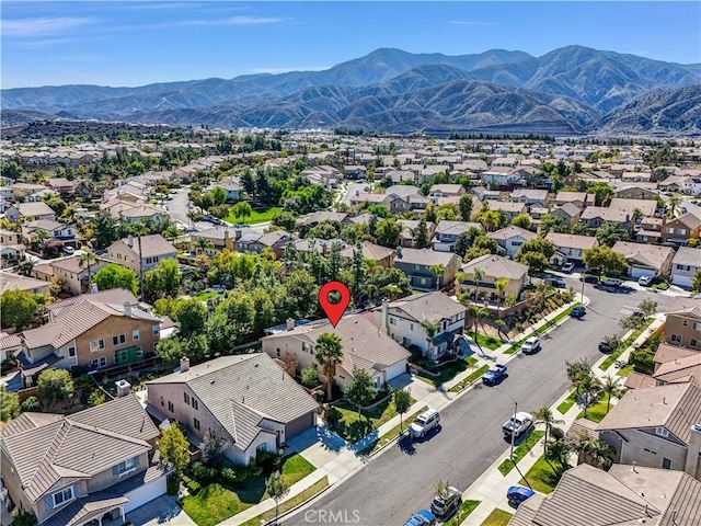 drone / aerial view with a residential view and a mountain view