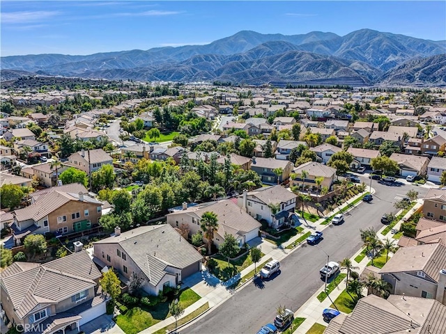 drone / aerial view with a residential view and a mountain view