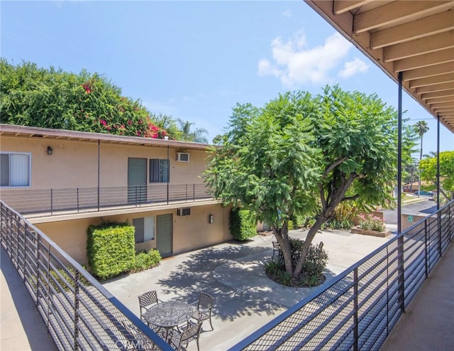 exterior space featuring a balcony