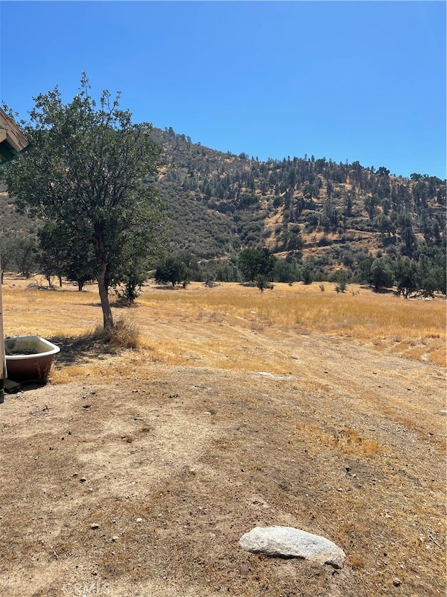 view of mountain feature with a rural view