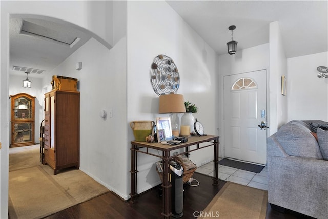 foyer featuring hardwood / wood-style floors