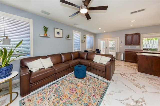 living room featuring ceiling fan