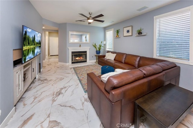 living room featuring ceiling fan