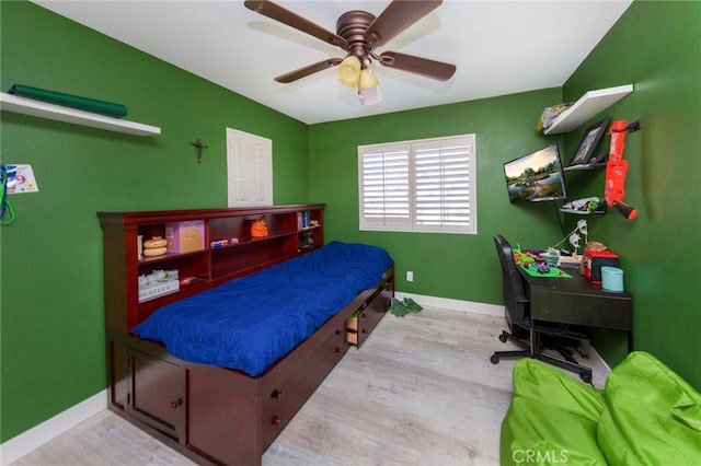 bedroom featuring ceiling fan and light hardwood / wood-style floors