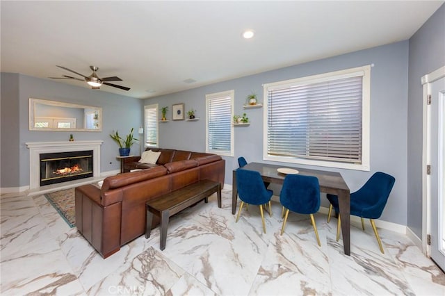 living room featuring ceiling fan