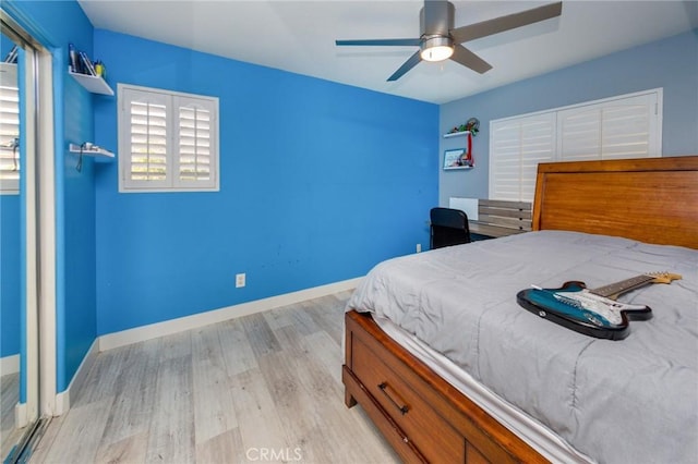 bedroom featuring ceiling fan and light hardwood / wood-style floors