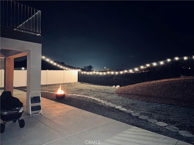 view of patio at twilight