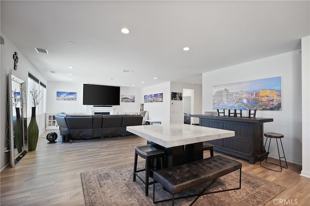 dining area with light wood-type flooring